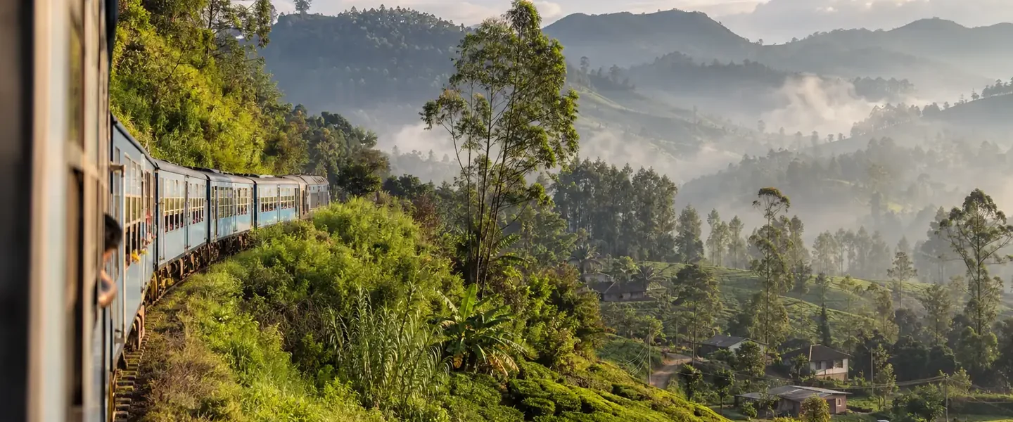 Train travelling through Sri Lanka’s green highlands and tea country